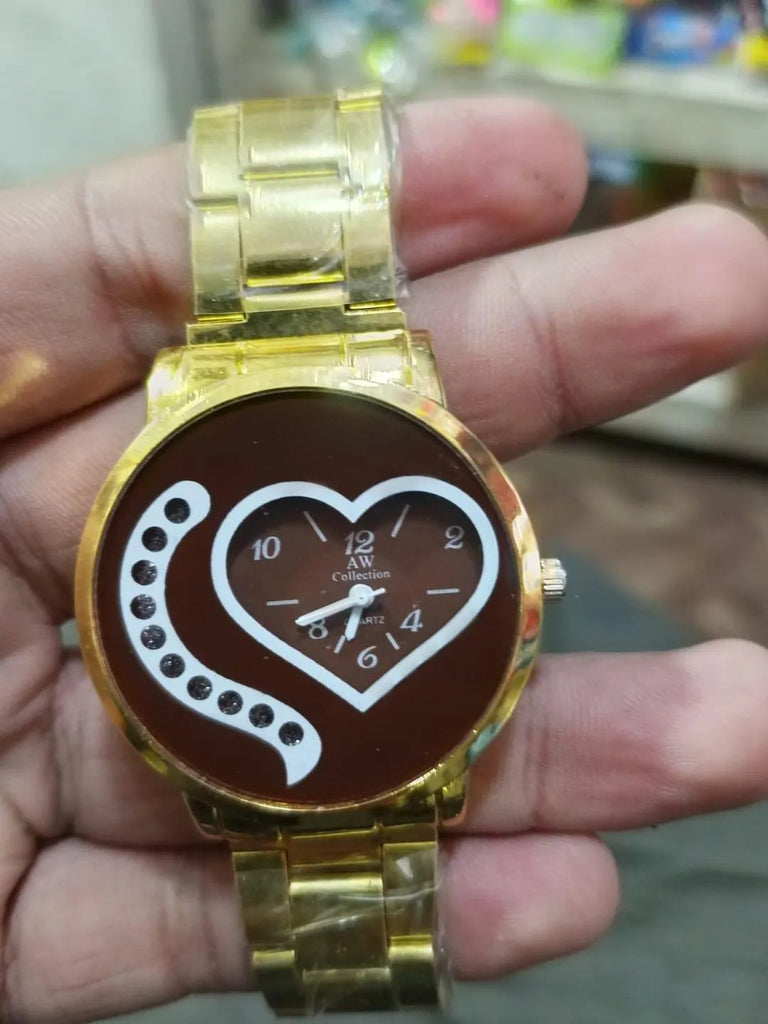 Luxury Gold Heart Dial Analog Watch for Women – Elegant Quartz Wrist Watch